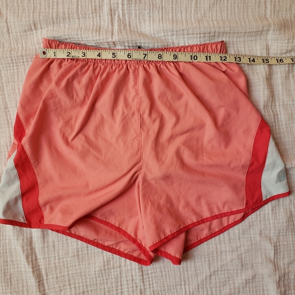 Relisted New Balance Running athletic shorts coral - Picture 3 of 8